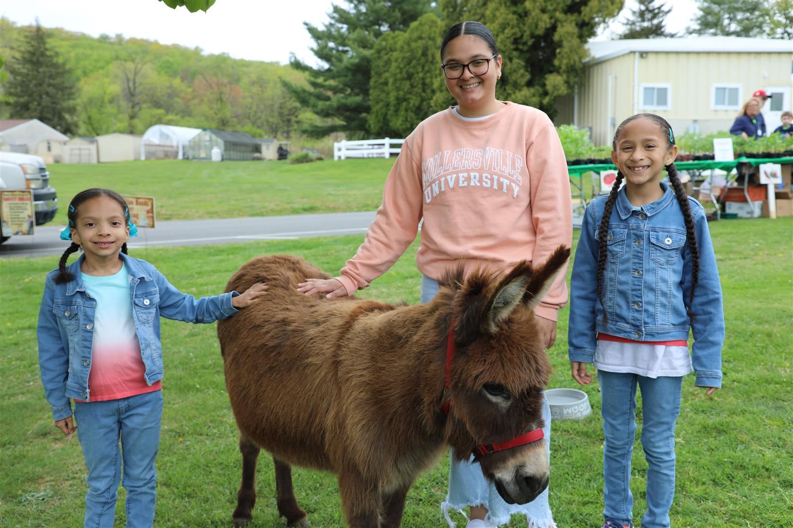 family petting animal